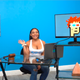 A CamSoda model hosts the site’s auction of the CryptoPunk 7060 NFT, which can be seen on the screen.